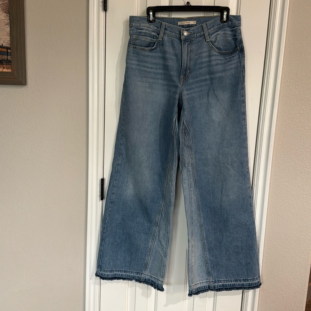 Levi 94 Baggy WIDE LEG 29/31 Indigo blue . Raw hem, mid rise .